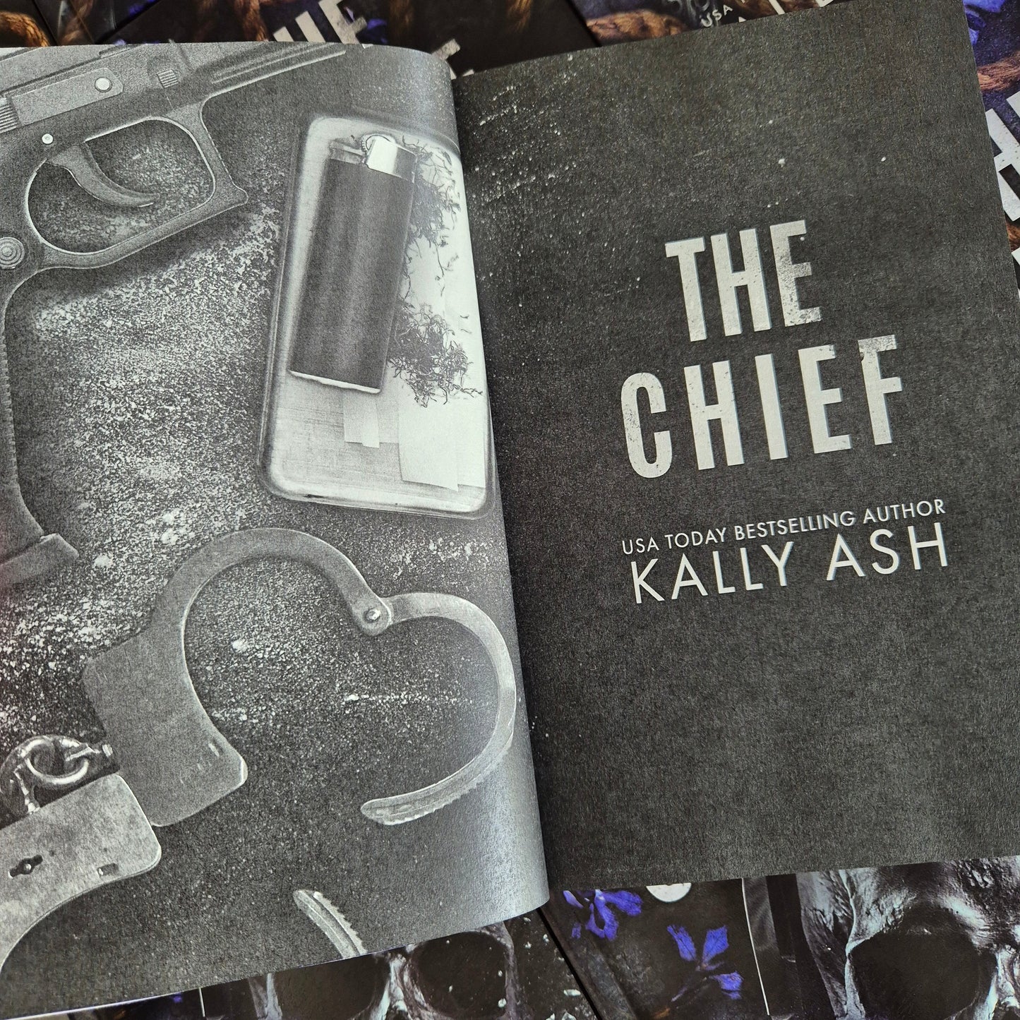 Book titled 'The Chief' by Kally Ash with a gun and handcuffs illustration on the header image.